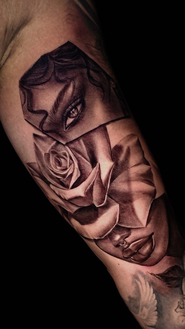 Surreal black-and-grey collage of facial features threaded with a rose, forearm